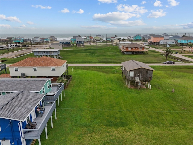 birds eye view of property with a residential view