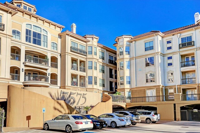 7575 Kirby Dr Unit 1108, Houston, TX 77030 - view of property featuring uncovered parking