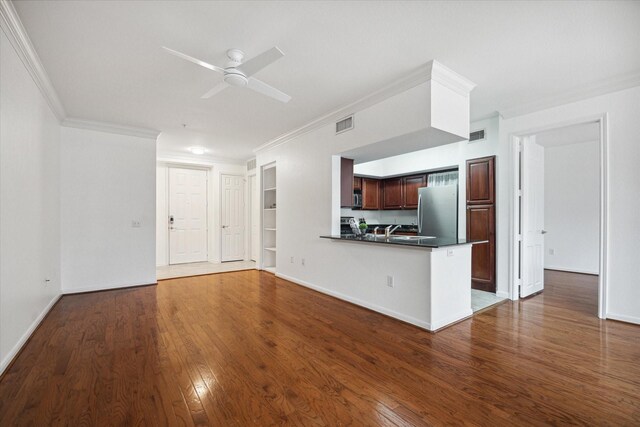 7575 Kirby Dr Unit 1108, Houston, TX 77030 - unfurnished living room with crown molding, baseboards, wood finished floors, and a ceiling fan