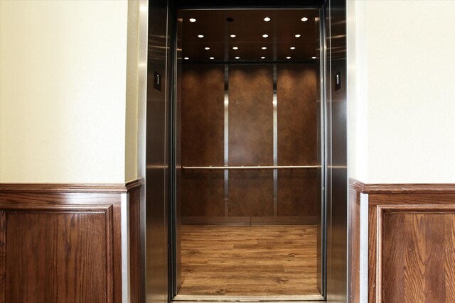 7575 Kirby Dr Unit 1108, Houston, TX 77030 - interior details with elevator and wood finished floors