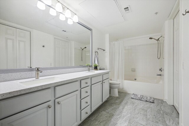 7575 Kirby Dr Unit 1108, Houston, TX 77030 - bathroom with double vanity, a sink, toilet, and visible vents