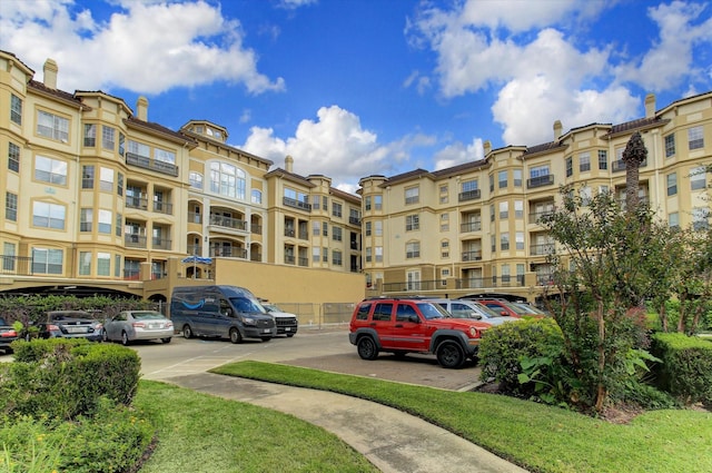 7575 Kirby Dr Unit 1108, Houston, TX 77030 - view of building exterior featuring uncovered parking