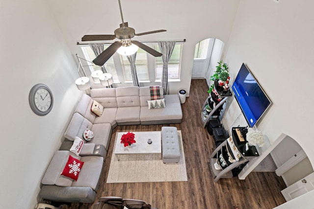 13754 Evansdale Ln, Houston, TX 77083 - living area with wood finished floors, a ceiling fan, and a high ceiling