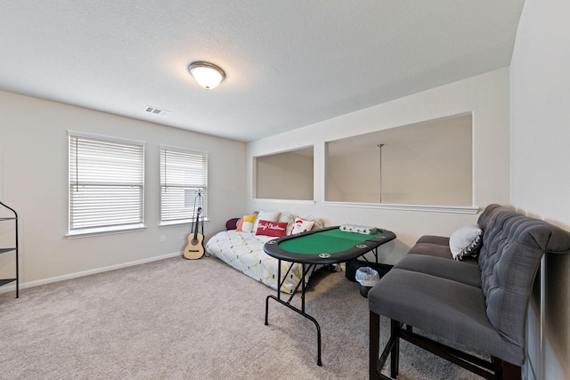 13754 Evansdale Ln, Houston, TX 77083 - game room with carpet, baseboards, and a textured ceiling