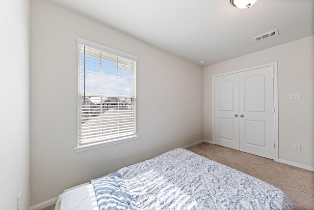 13754 Evansdale Ln, Houston, TX 77083 - carpeted bedroom with a closet and baseboards