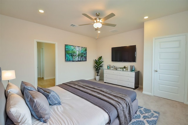 bedroom featuring light colored carpet, recessed lighting, baseboards, visible vents, and a ceiling fan