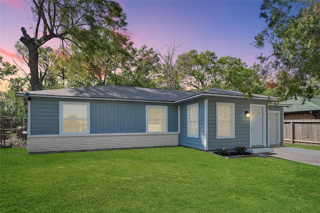 11423 Raincove Dr, Houston, TX 77016 - ranch-style home featuring a garage, fence, brick siding, a front lawn, and driveway