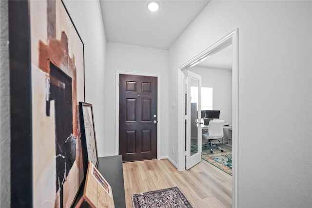 30208 Arnold Branch Dr, Magnolia, TX 77355 - entrance foyer featuring baseboards and wood finished floors