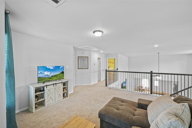 30208 Arnold Branch Dr, Magnolia, TX 77355 - carpeted living room featuring baseboards, attic access, and visible vents