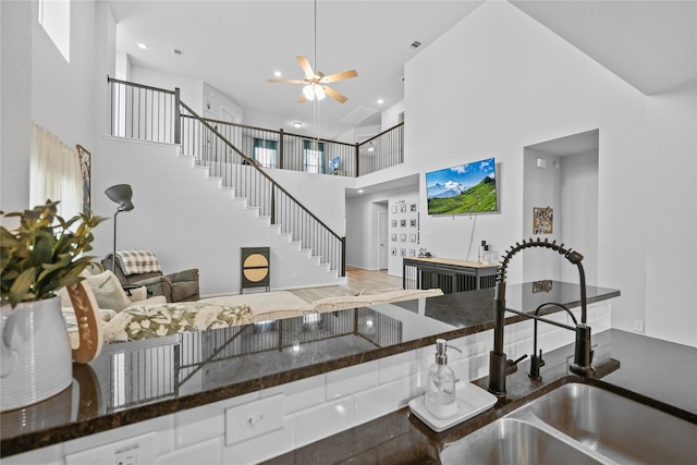 30208 Arnold Branch Dr, Magnolia, TX 77355 - interior space featuring stairway, ceiling fan, recessed lighting, and a towering ceiling