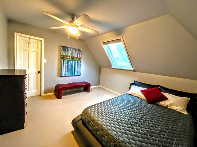 4401 Roseland St, Houston, TX 77006 - bedroom featuring lofted ceiling, carpet floors, a skylight, a ceiling fan, and baseboards