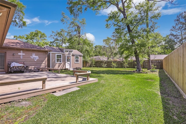16002 Castaway Ct, Crosby, TX 77532 - view of yard featuring a wooden deck and an outdoor structure
