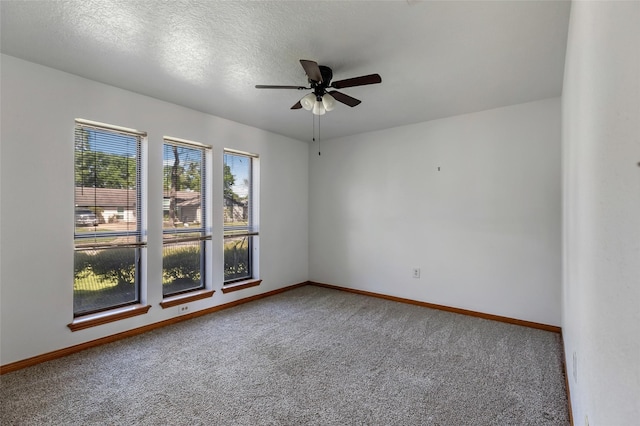 16002 Castaway Ct, Crosby, TX 77532 - spare room featuring carpet floors, ceiling fan, and baseboards