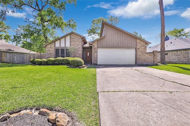 16002 Castaway Ct, Crosby, TX 77532 - mid-century home with an attached garage, driveway, and brick siding