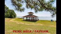 16002 Castaway Ct, Crosby, TX 77532 - view of community featuring a water view, a gazebo, and a lawn
