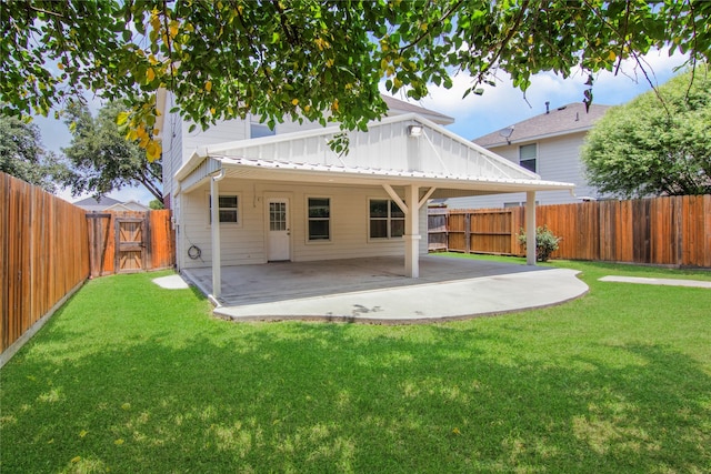 18911 Brownstone Mills Dr, Cypress, TX 77433 - back of house featuring a patio and a gate