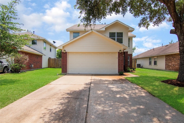 18911 Brownstone Mills Dr, Cypress, TX 77433 - traditional-style home with brick siding, a garage, cooling unit, and concrete driveway