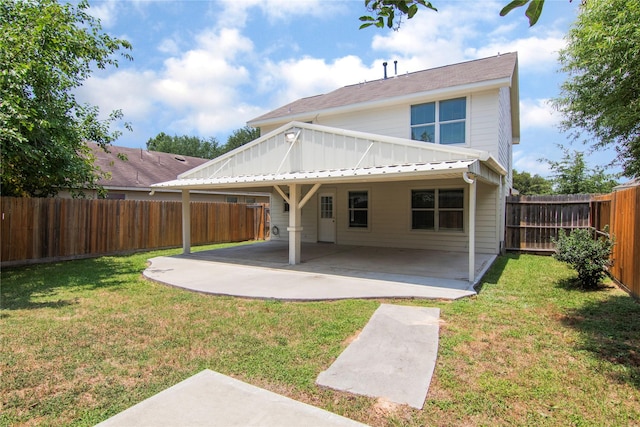 18911 Brownstone Mills Dr, Cypress, TX 77433 - rear view of house featuring a patio