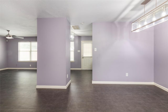 18911 Brownstone Mills Dr, Cypress, TX 77433 - unfurnished room featuring ceiling fan and baseboards