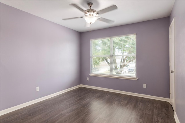 18911 Brownstone Mills Dr, Cypress, TX 77433 - empty room featuring ceiling fan, baseboards, and dark wood finished floors