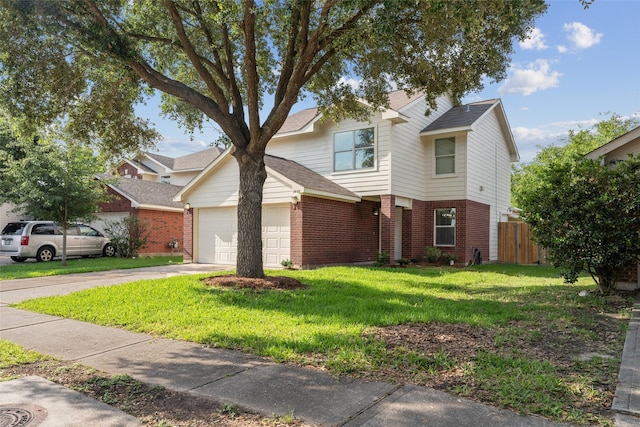 18911 Brownstone Mills Dr, Cypress, TX 77433 - traditional home with brick siding, concrete driveway, a garage, and a shingled roof
