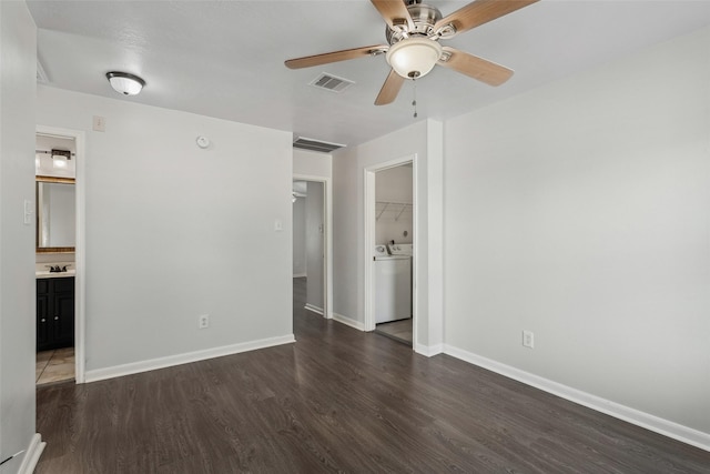 18911 Brownstone Mills Dr, Cypress, TX 77433 - unfurnished bedroom featuring washer / dryer, wood finished floors, baseboards, and ensuite bath