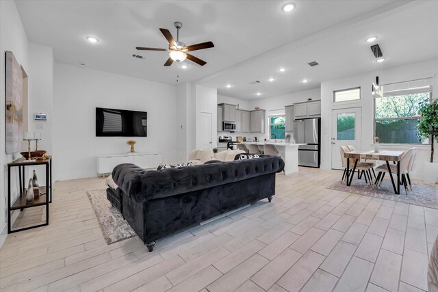 7914 Starfish Arbor Dr, Cypress, TX 77433 - living area featuring a ceiling fan and recessed lighting