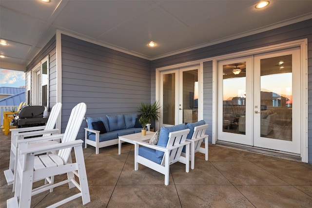 view of patio with an outdoor living space and french doors