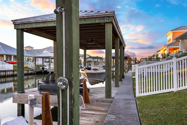 dock area featuring a water view and boat lift