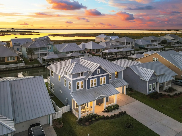 birds eye view of property with a residential view