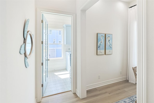 11367 Beachside Dr, Galveston, TX 77554 - hall with baseboards and light wood-type flooring
