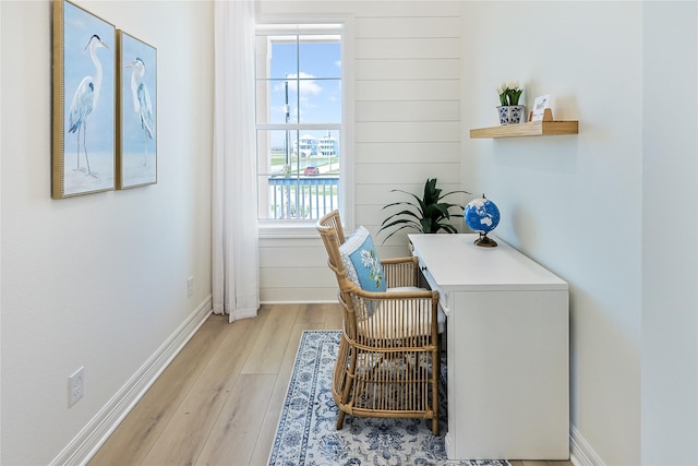 11367 Beachside Dr, Galveston, TX 77554 - office space with light wood-style floors, baseboards, and a water view