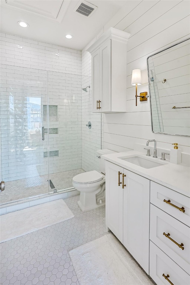 11367 Beachside Dr, Galveston, TX 77554 - full bathroom featuring visible vents, a stall shower, vanity, toilet, and recessed lighting