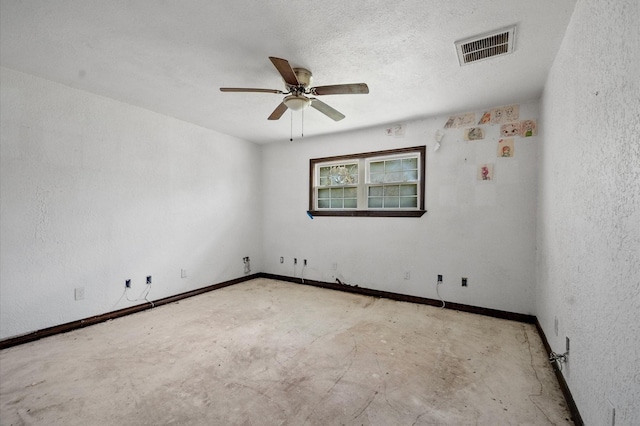 5401 Bayou Dr, Dickinson, TX 77539 - empty room featuring a ceiling fan, a textured wall, baseboards, and visible vents