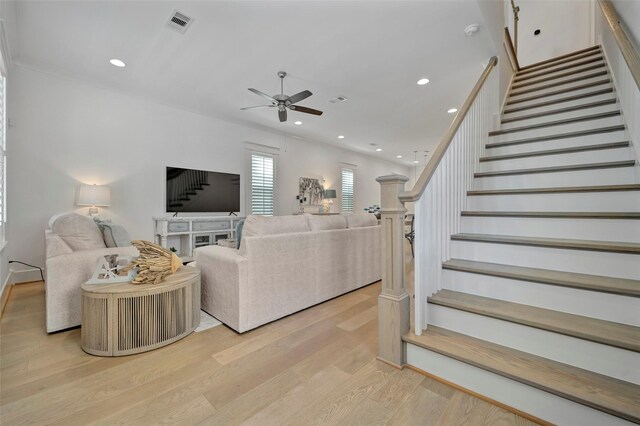 4 Caravelle Ct, Galveston, TX 77554 - living area with ceiling fan, stairs, light wood-style flooring, and recessed lighting