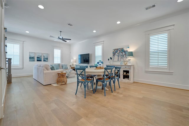 4 Caravelle Ct, Galveston, TX 77554 - dining space featuring light wood-style flooring, baseboards, ceiling fan, and recessed lighting