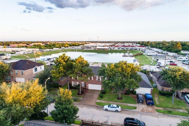 birds eye view of property with a residential view