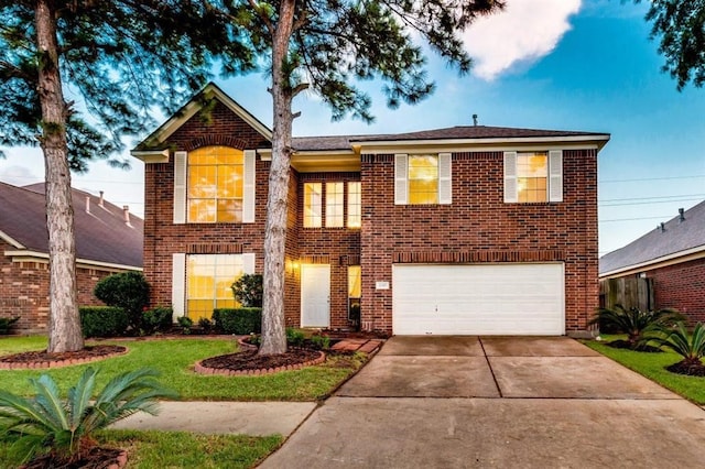 view of front of house with driveway, brick siding, and a garage