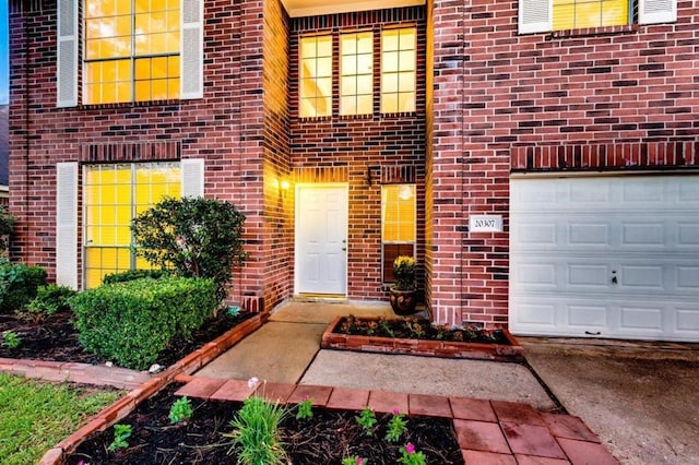 property entrance with brick siding