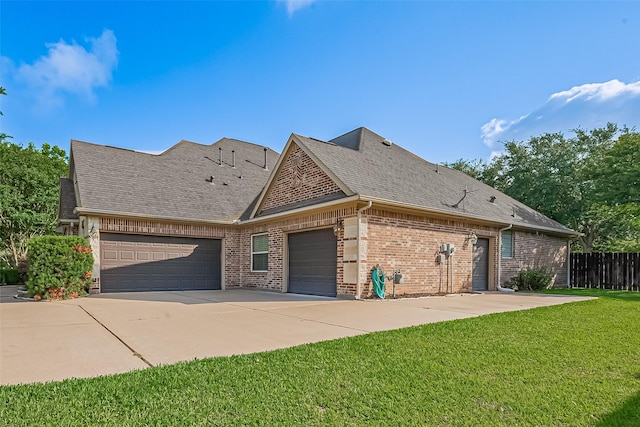 4210 Wentworth Dr, Fulshear, TX 77441 - view of front facade with brick siding, an attached garage, roof with shingles, and driveway