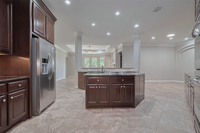 4210 Wentworth Dr, Fulshear, TX 77441 - kitchen featuring stainless steel appliances, ornamental molding, baseboards, ceiling fan, and recessed lighting