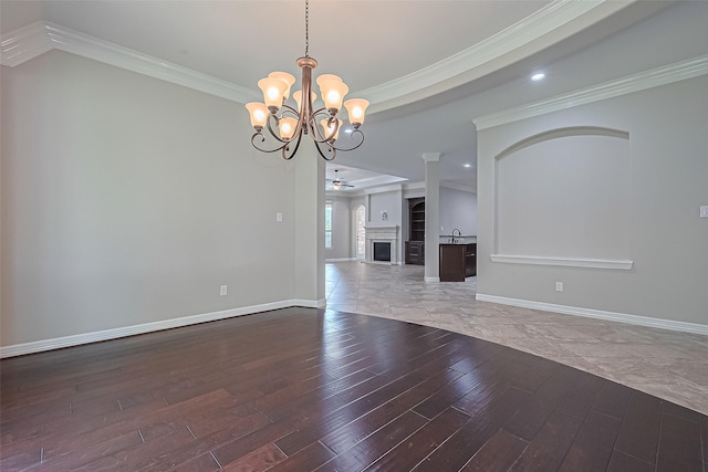 4210 Wentworth Dr, Fulshear, TX 77441 - unfurnished living room featuring hardwood / wood-style flooring, a chandelier, baseboards, crown molding, and recessed lighting