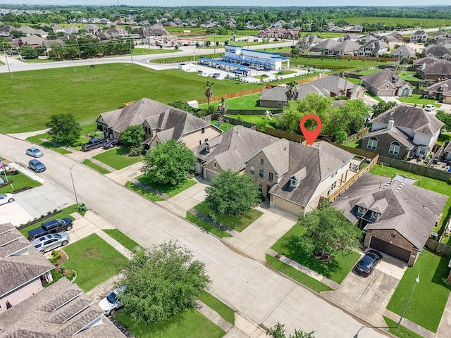 4810 Legends Bay Dr, Baytown, TX 77523 - drone / aerial view featuring a residential view