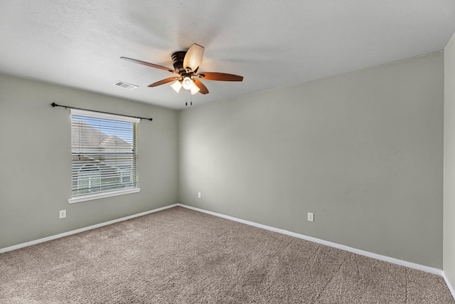 4810 Legends Bay Dr, Baytown, TX 77523 - carpeted spare room featuring baseboards, a ceiling fan, and visible vents