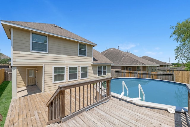 4810 Legends Bay Dr, Baytown, TX 77523 - view of pool with a fenced backyard and a wooden deck
