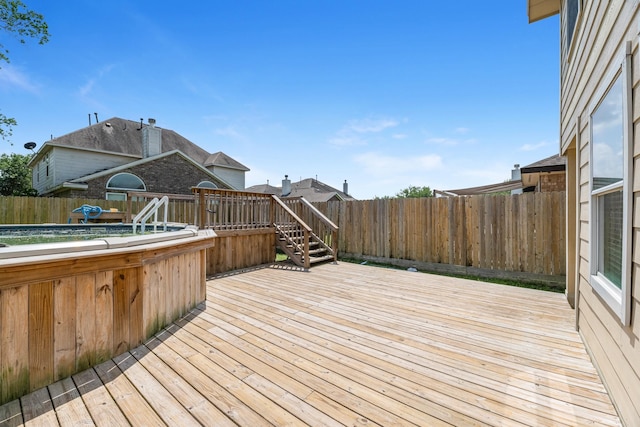 4810 Legends Bay Dr, Baytown, TX 77523 - wooden deck featuring a fenced backyard and stairs