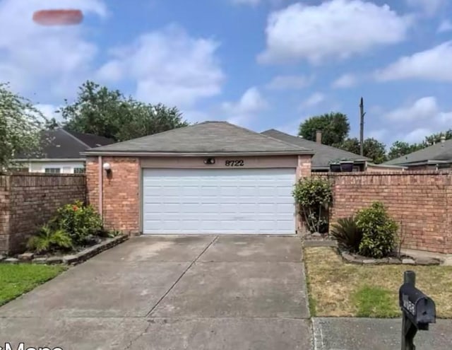 8722 Beau Monde Dr, Houston, TX 77099 - garage with concrete driveway