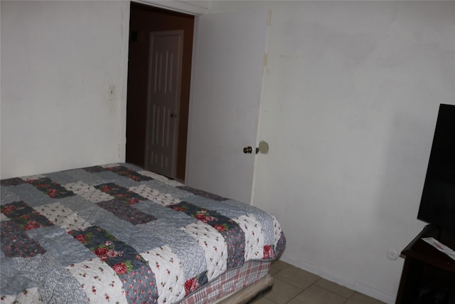 8722 Beau Monde Dr, Houston, TX 77099 - bedroom with light tile patterned flooring