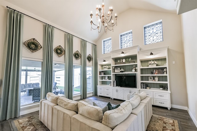 20207 Desert Foal Dr, Tomball, TX 77377 - living area featuring high vaulted ceiling, a chandelier, dark wood-style flooring, and baseboards