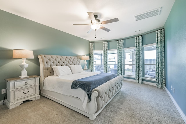 20207 Desert Foal Dr, Tomball, TX 77377 - bedroom featuring light colored carpet, baseboards, and ceiling fan